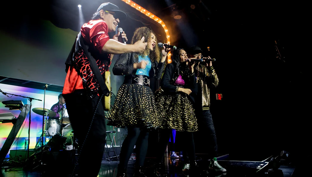 Band performing on stage during The Jets: Back to the 80's & 90's Experience.