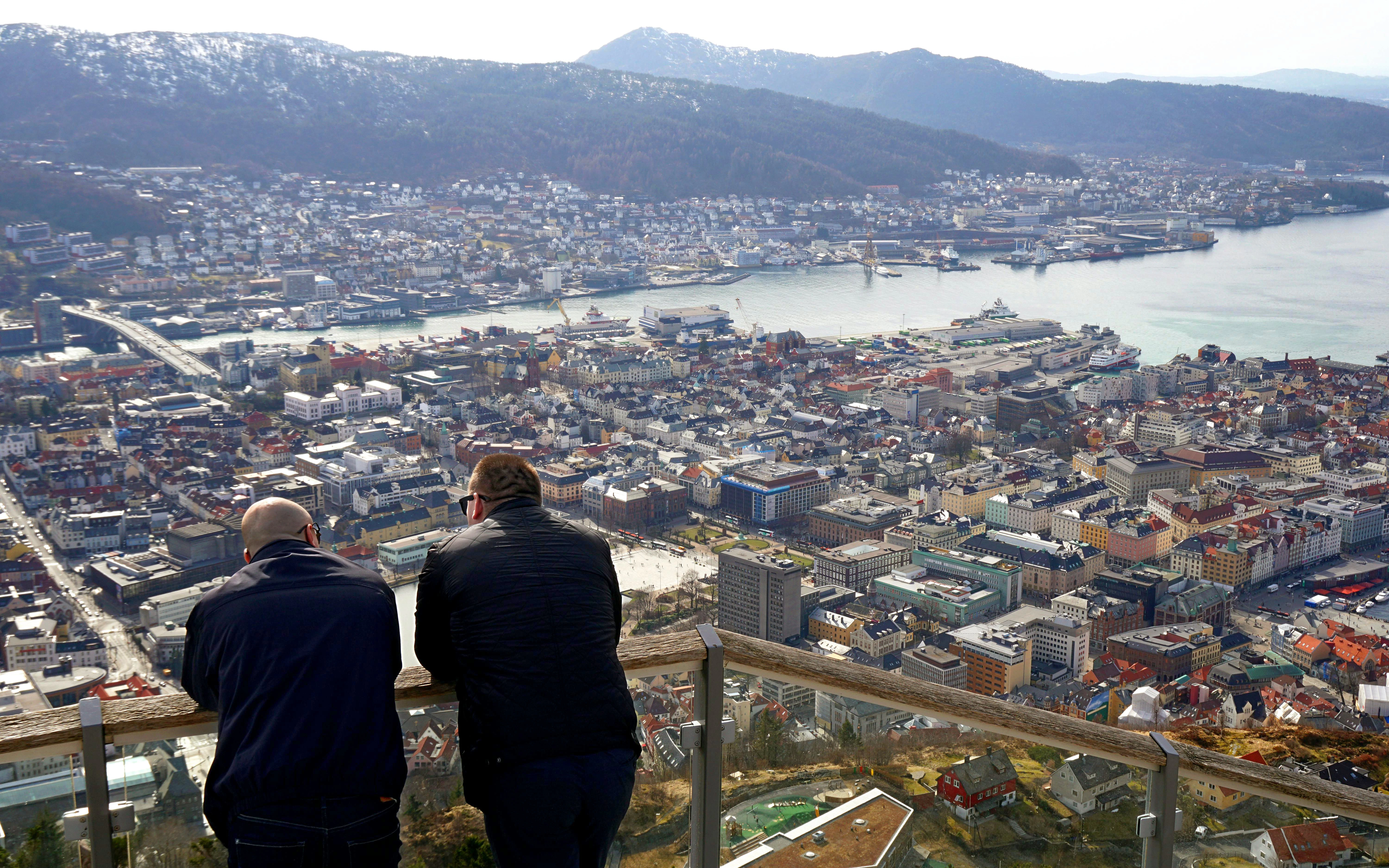View of Bergen, Norway from Mount Floyen with Floibanen cable car and cityscape.