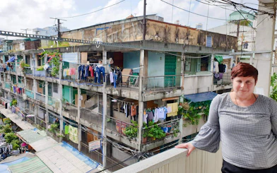 Balcony view of local apartments with laundry hanging, Saigon Hidden Gems Day Tour, Ho Chi Minh City.