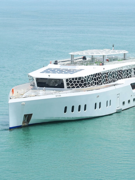 Lotus Mega Yacht cruising in Dubai Marina waters.
