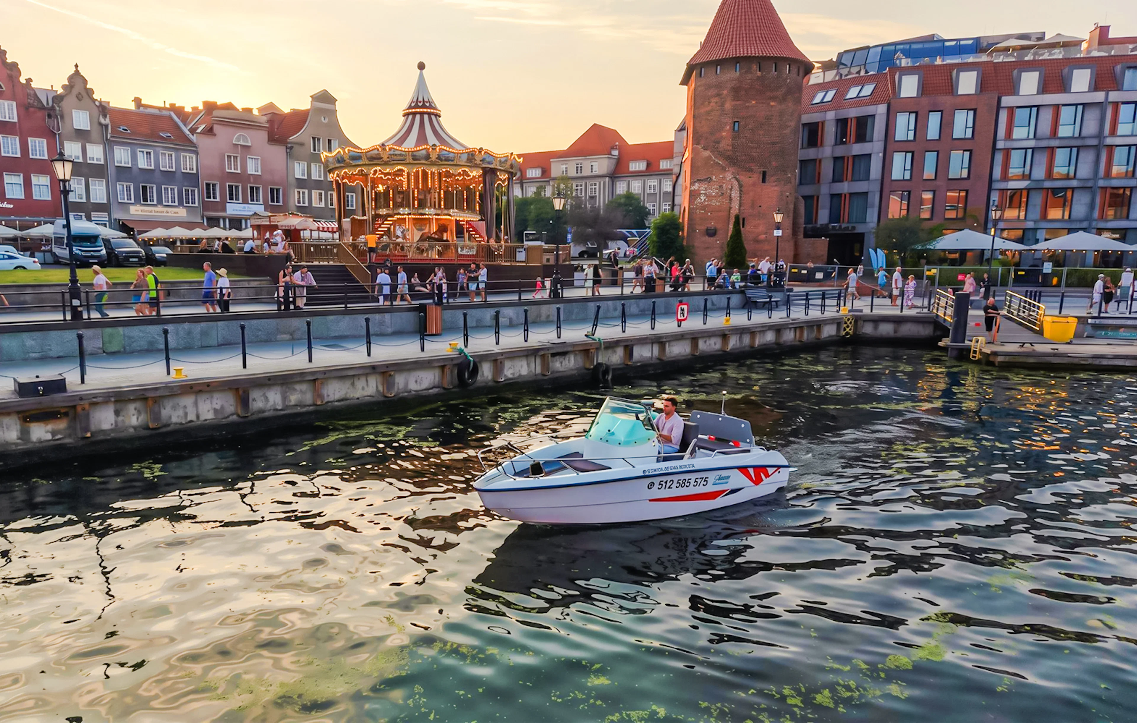 Electric boat on Gdansk harbour during Motława Sunset Cruise with historic buildings in background.