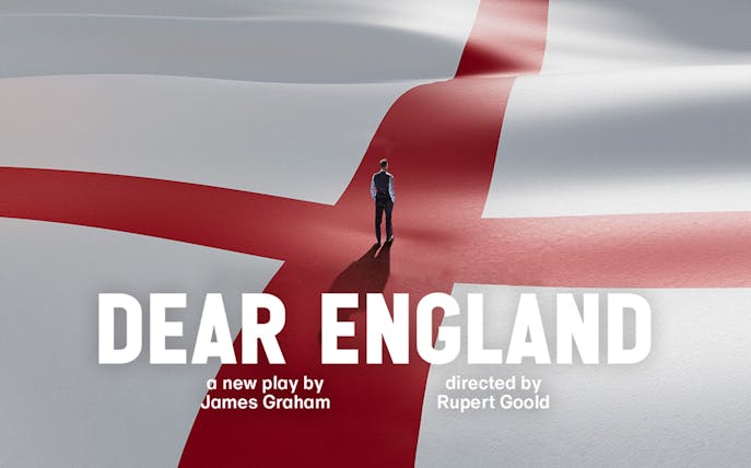 Person standing on large England flag with "Dear England" text.