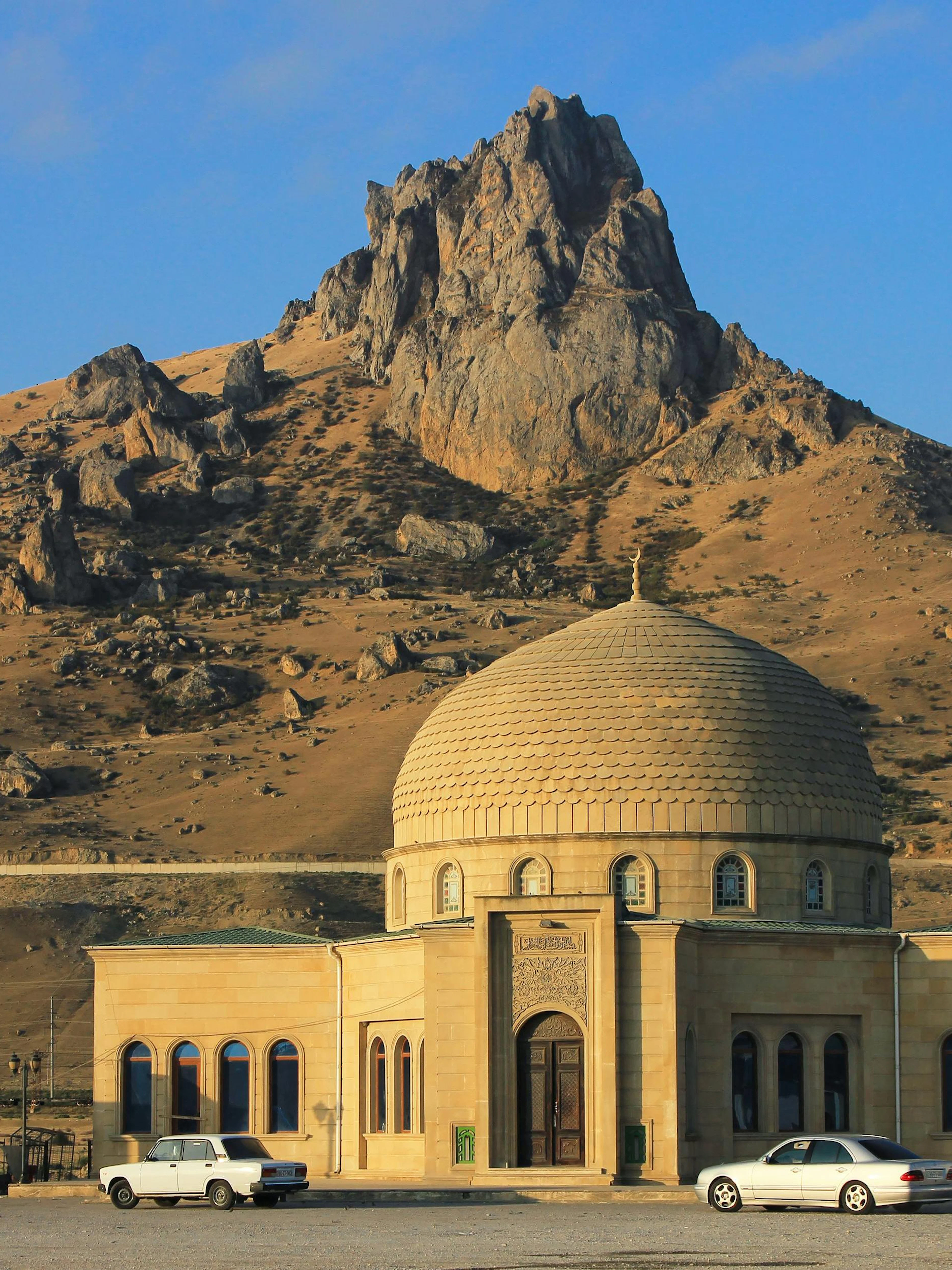 Sacred Five Fingers Mountain with a domed building in Guba, Azerbaijan.