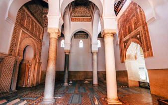 Saadian Tombs interior with ornate arches and columns in Marrakech, Morocco.