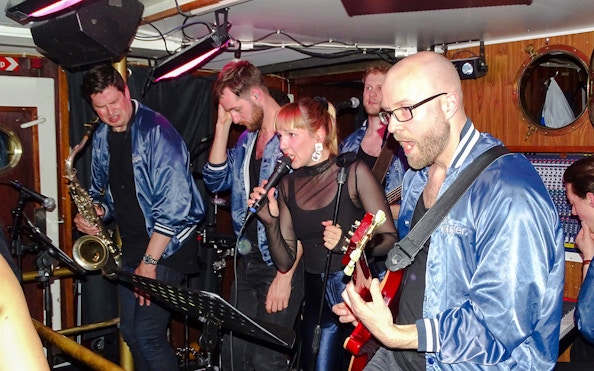Live band performing on a Stockholm archipelago tour boat.