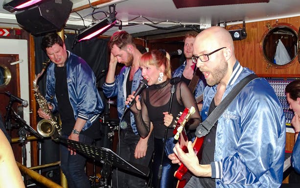 Live band performing on a Stockholm archipelago tour boat.