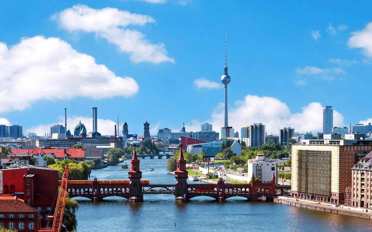 Oberbaum Bridge over the Spree River with Berlin TV Tower in the background, Berlin Kreuzberg.