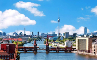 Oberbaum Bridge over the Spree River with Berlin TV Tower in the background, Berlin Kreuzberg.