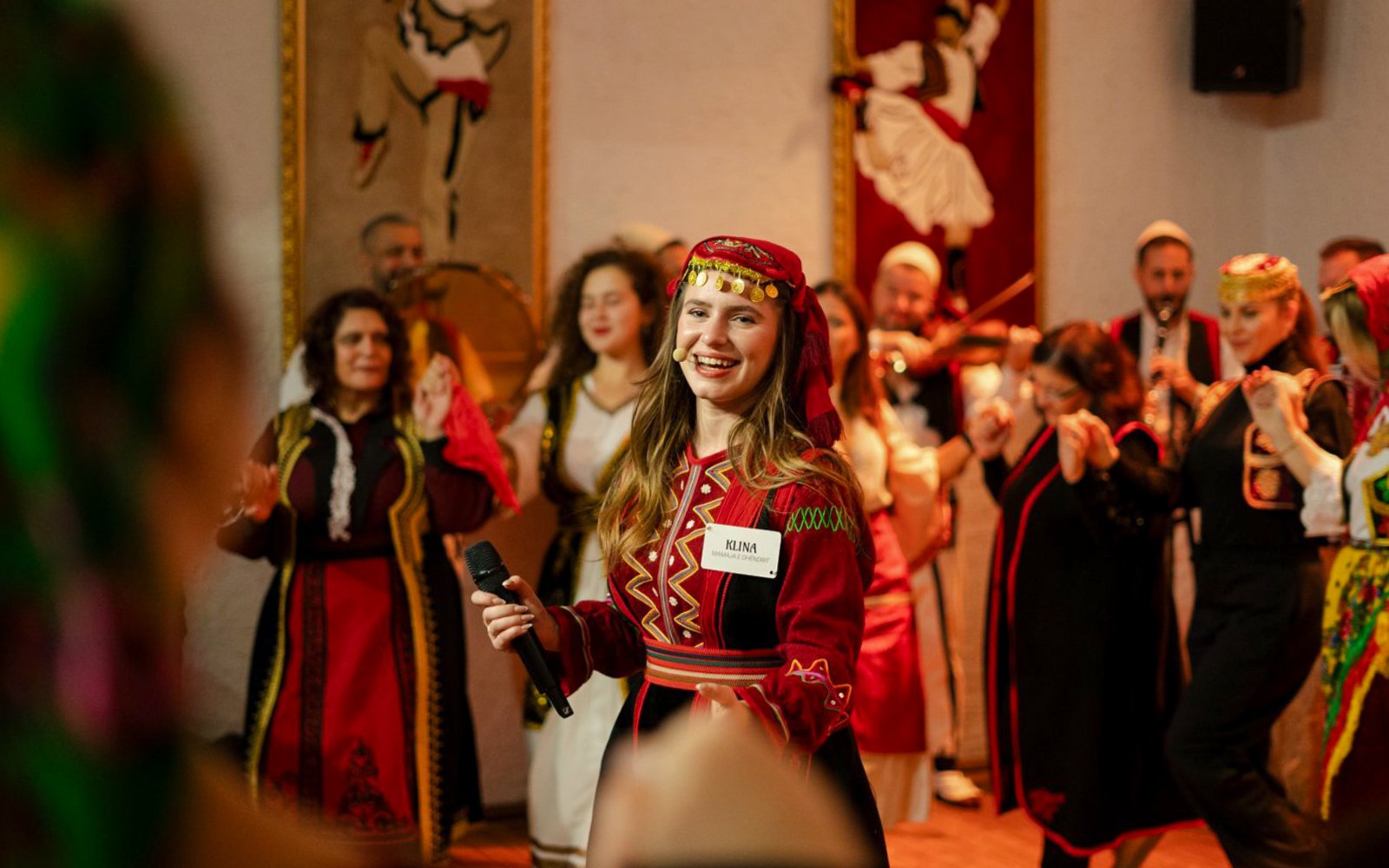 Artists performing traditional dance during Albanian Night Cultural Dance & Music Experience.