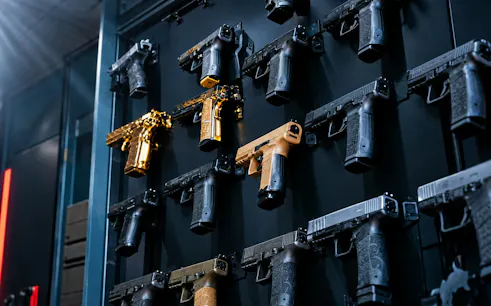 Handguns displayed on a wall at Poligon Istanbul indoor shooting range, Istanbul.