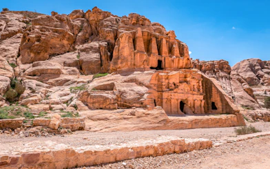 Nabataean tombs carved into sandstone cliffs in Petra, Jordan.