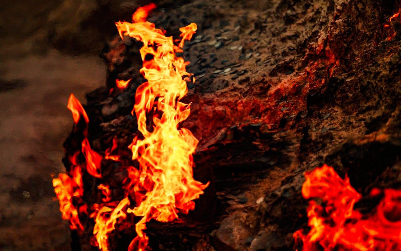 Yanardag natural gas fire burning on hillside in Azerbaijan.
