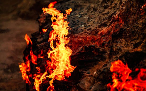 Yanardag natural gas fire burning on hillside in Azerbaijan.