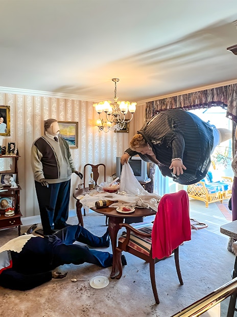 Dursley living room scene with floating Aunt Marge at Harry Potter London tour exhibit.