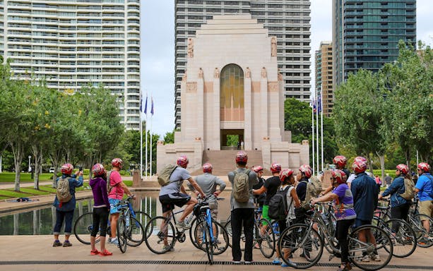 Cyclists on Bonza Bike Tours at Anzac Memorial, Sydney.