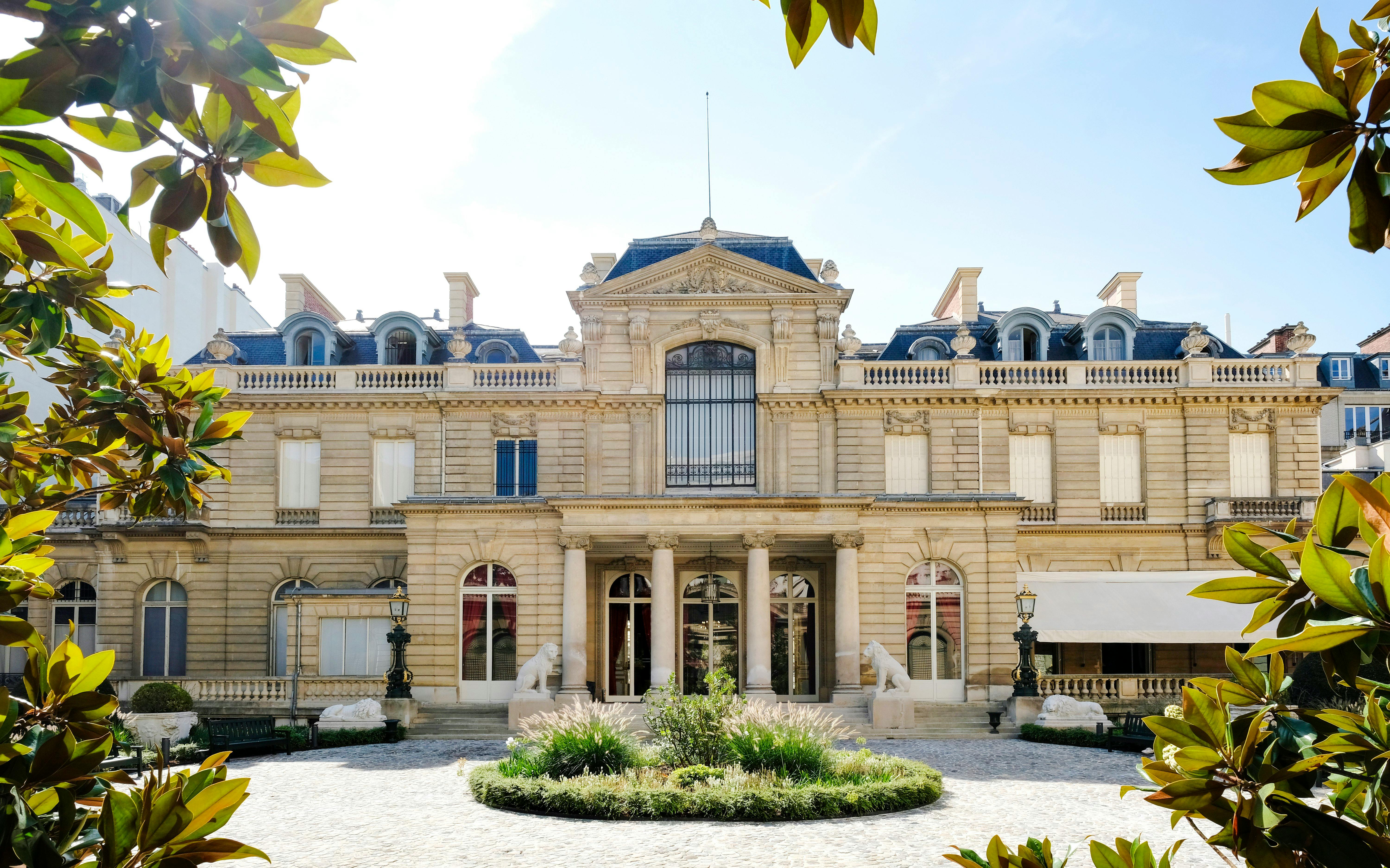 Jacquemart André Museum facade with ornate architecture and garden in Paris.