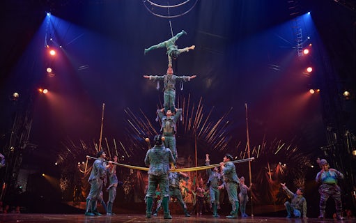 Acrobats performing a human pyramid at Cirque du Soleil: Alegría in Seville.