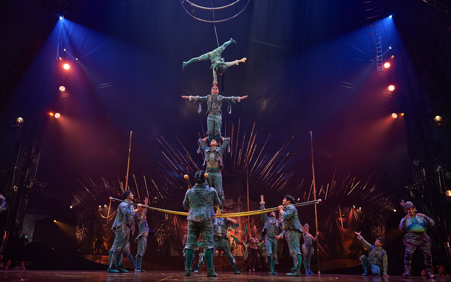 Acrobats performing a human pyramid at Cirque du Soleil: Alegría in Seville.