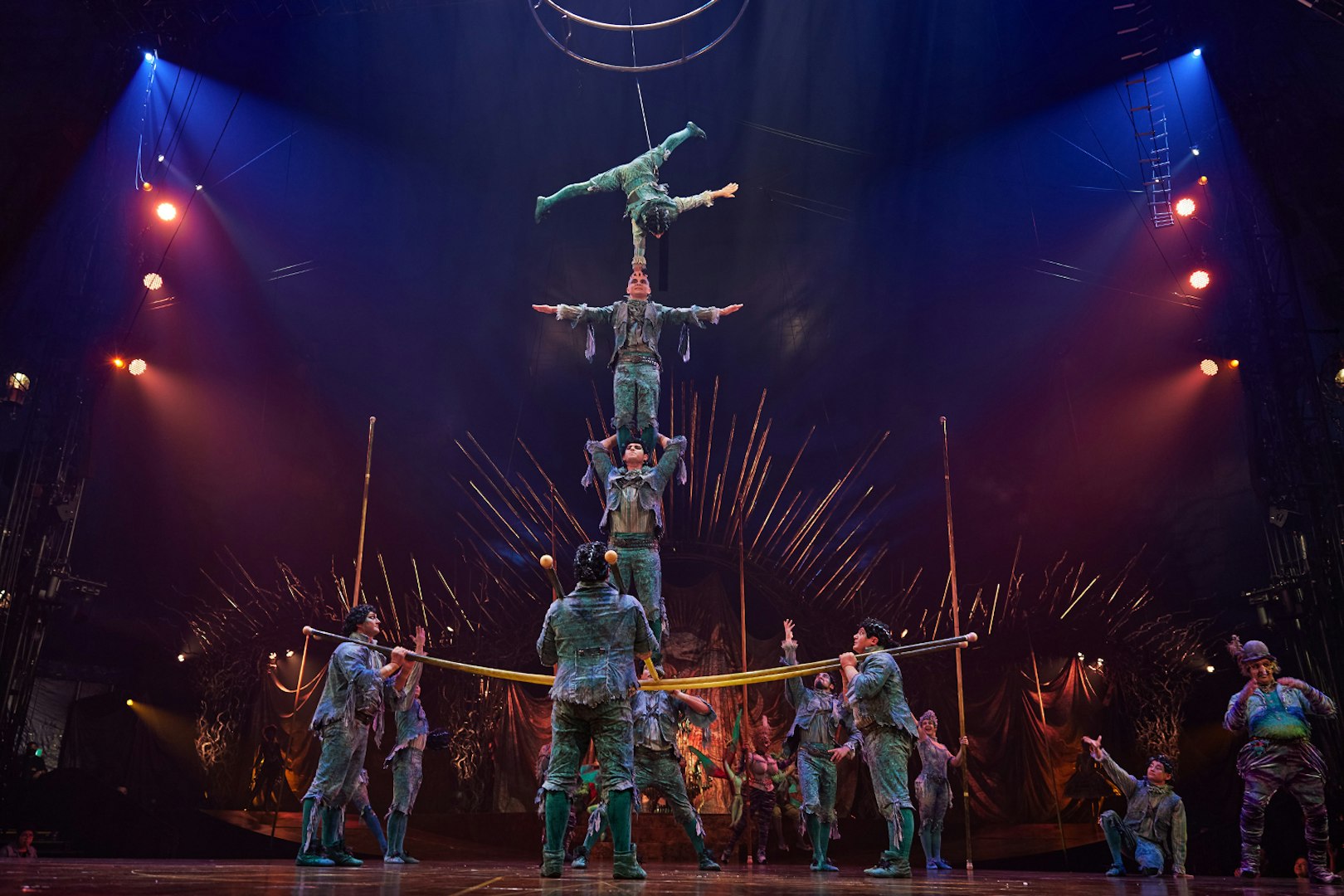Acrobats performing a human pyramid at Cirque du Soleil: Alegría in Seville.