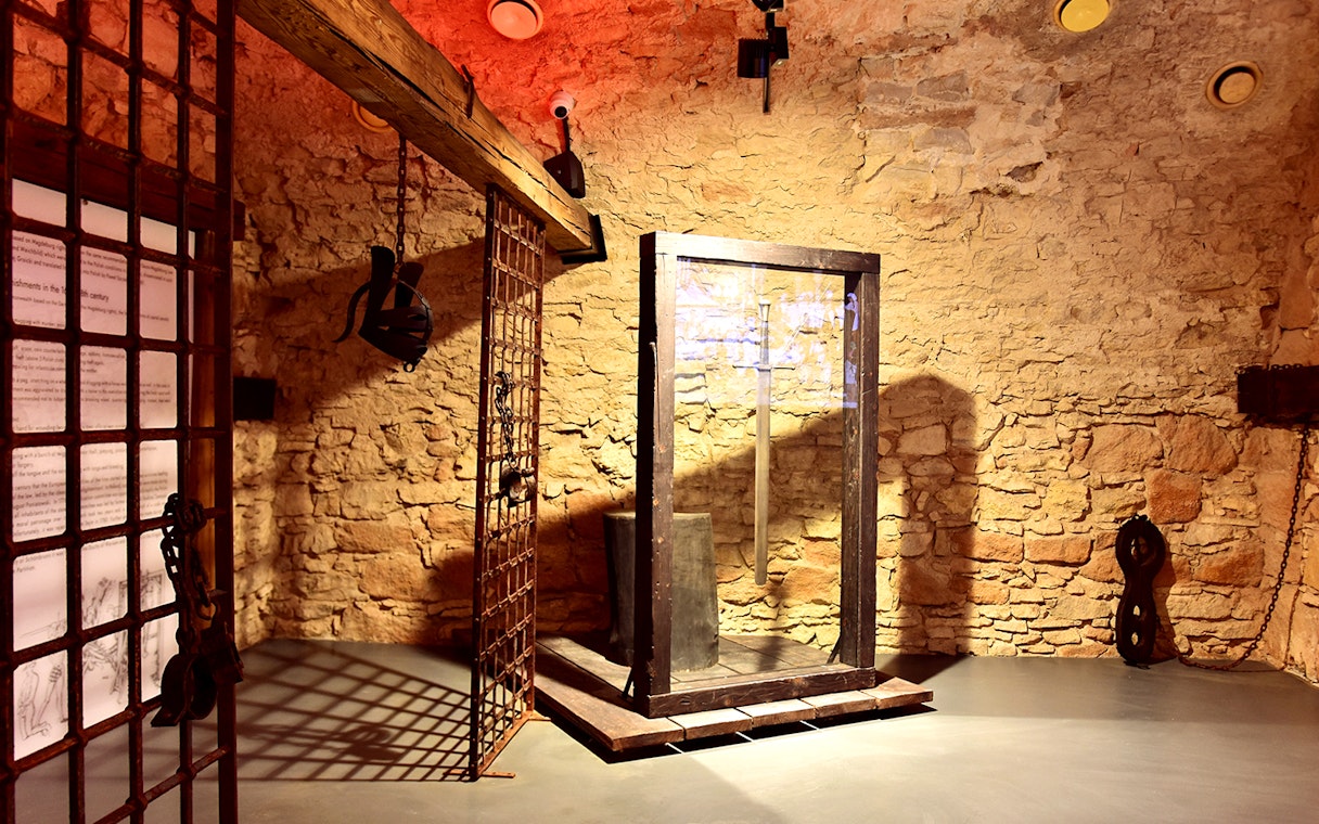 Rynek Underground exhibit with medieval artifacts in Krakow's Old Town.