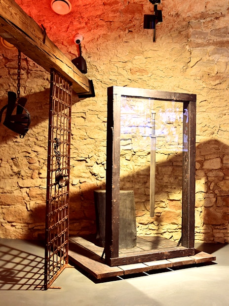 Rynek Underground exhibit with medieval artifacts in Krakow's Old Town.