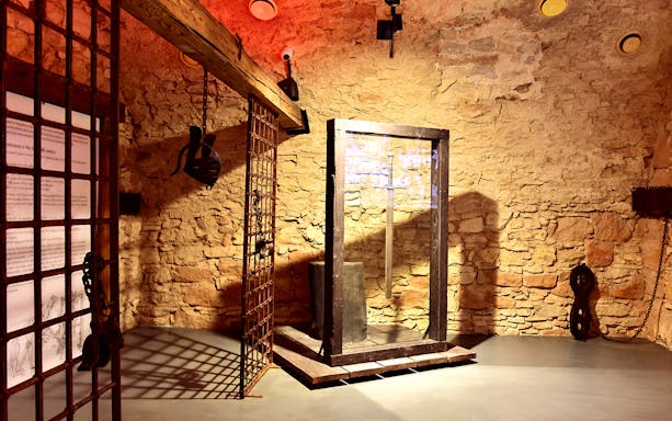 Rynek Underground exhibit with medieval artifacts in Krakow's Old Town.