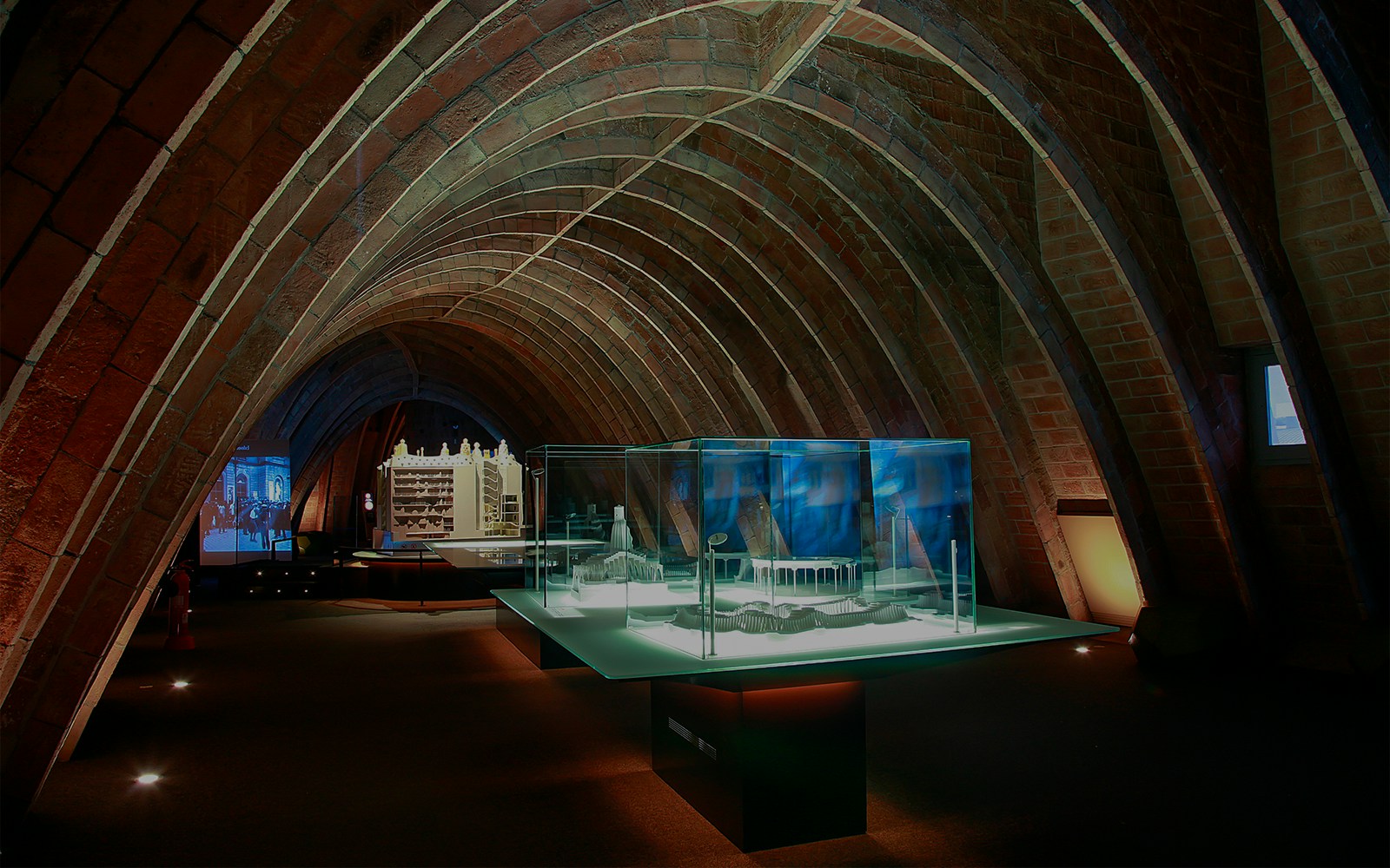 La Pedrera attic with architectural models and arched brick ceiling, Barcelona.