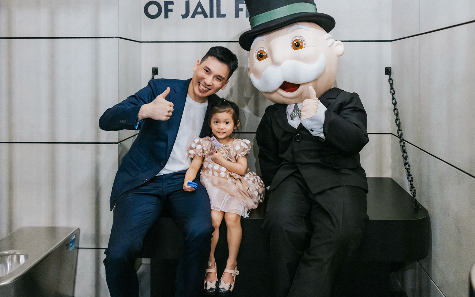 Man and child with Monopoly mascot at Monopoly Dreams Melbourne.