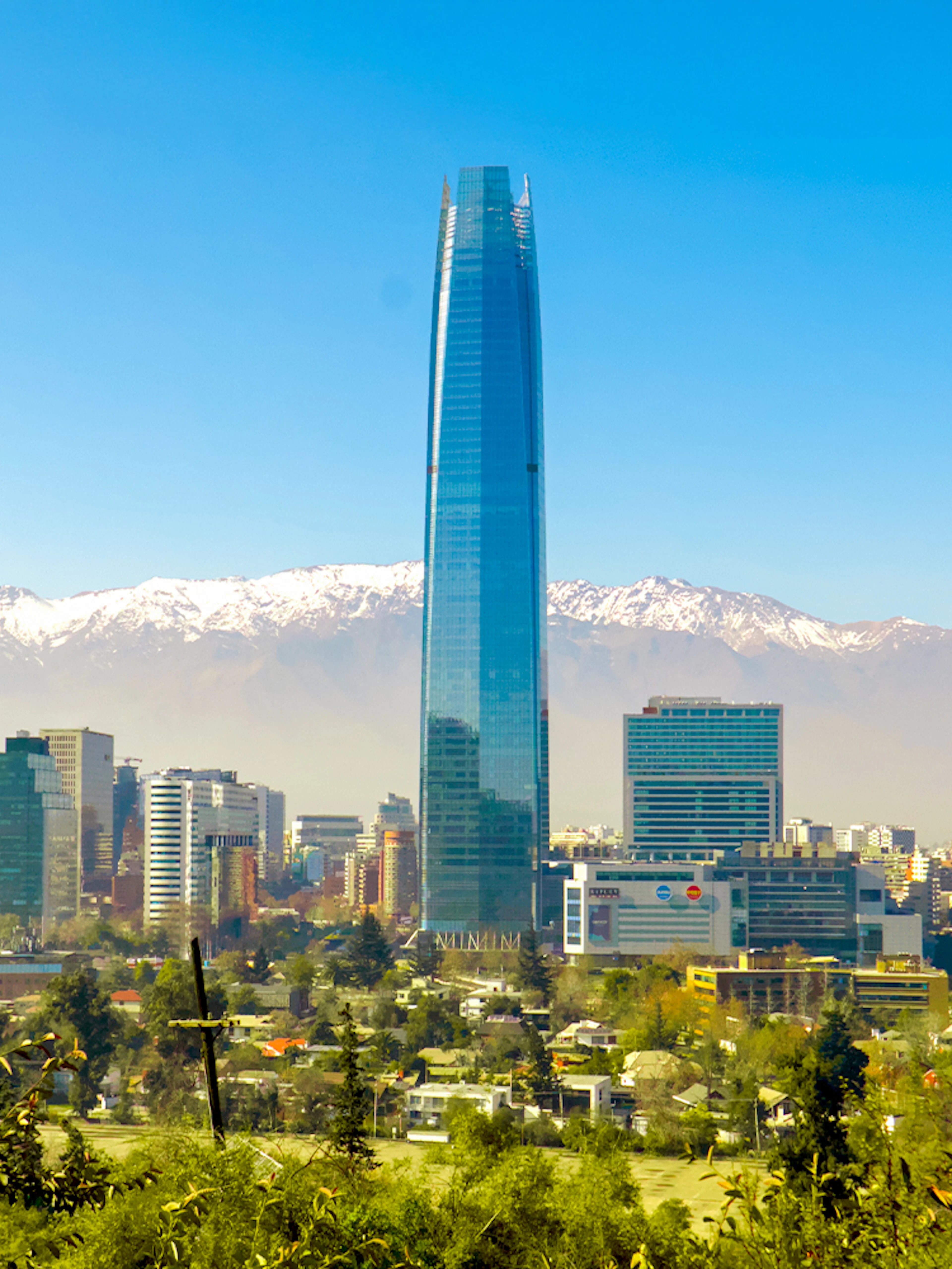 Costanera Center skyscraper with Andes mountains in Santiago, Chile.