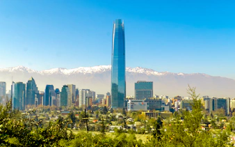 Costanera Center skyscraper with Andes mountains in Santiago, Chile.