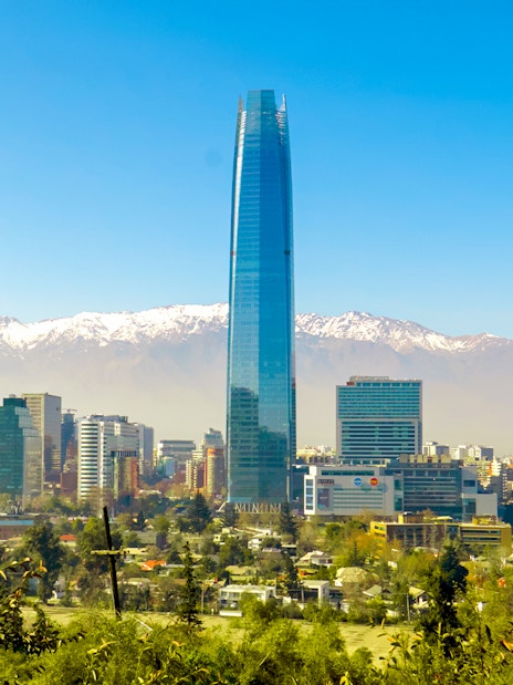 Costanera Center skyscraper with Andes mountains in Santiago, Chile.