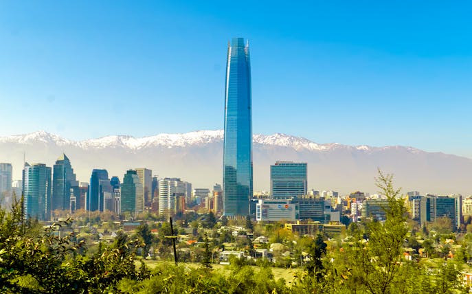 Costanera Center skyscraper with Andes mountains in Santiago, Chile.