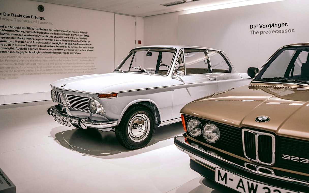 Vintage BMW cars displayed at the BMW Museum in Munich.