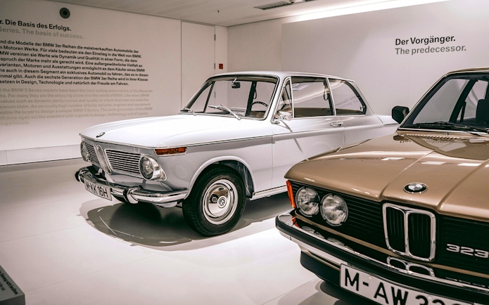 Vintage BMW cars displayed at the BMW Museum in Munich.