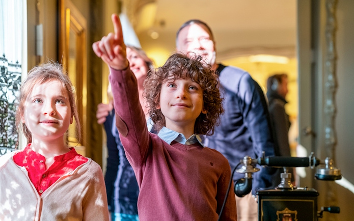 Children exploring Casa Milà during La Pedrera Sunrise Tour.