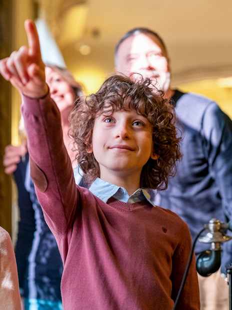 Children exploring Casa Milà during La Pedrera Sunrise Tour.