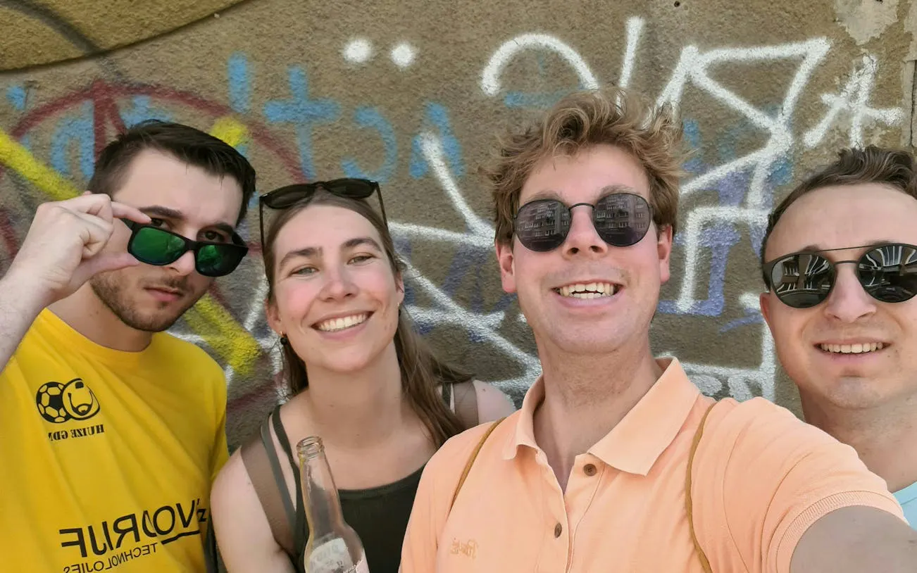Group of tourists in Sofia enjoying a self-guided city exploration game.