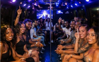 Partygoers enjoying Sint Maarten nightlife tour on a bus with vibrant lights and drinks.