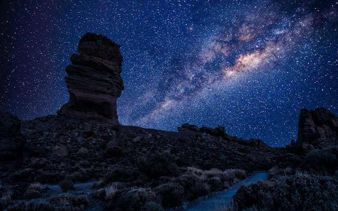 Milky Way over Roque Cinchado at Roques de Garcia, Las Cañadas del Teide, Tenerife.