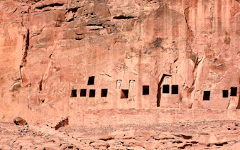Ancient rock-cut tombs at Dadan in AlUla, Medina, part of the guided tour.