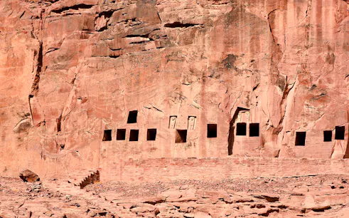Ancient rock-cut tombs at Dadan in AlUla, Medina, part of the guided tour.