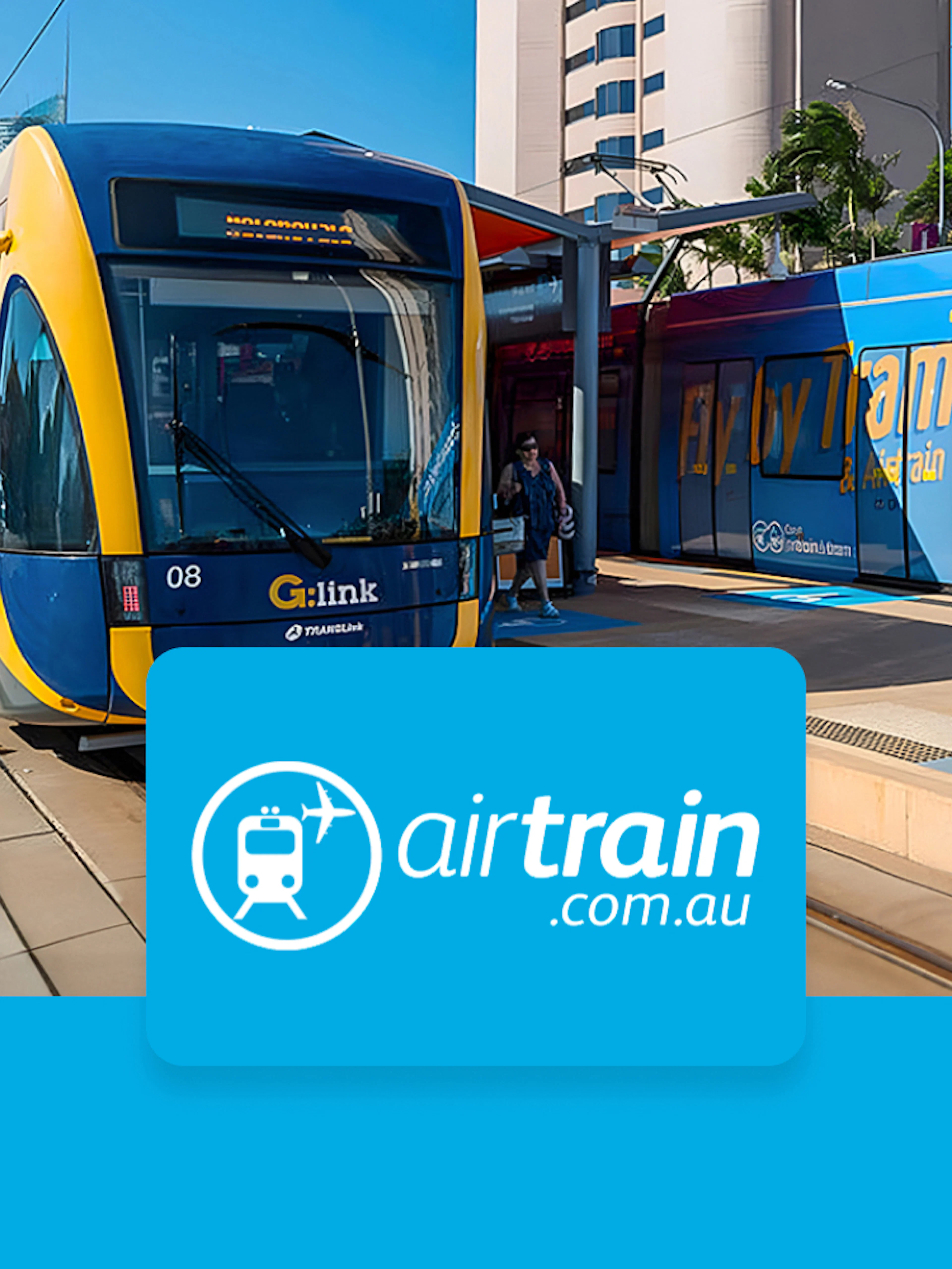 Brisbane Airtrain at station with city skyline in background.