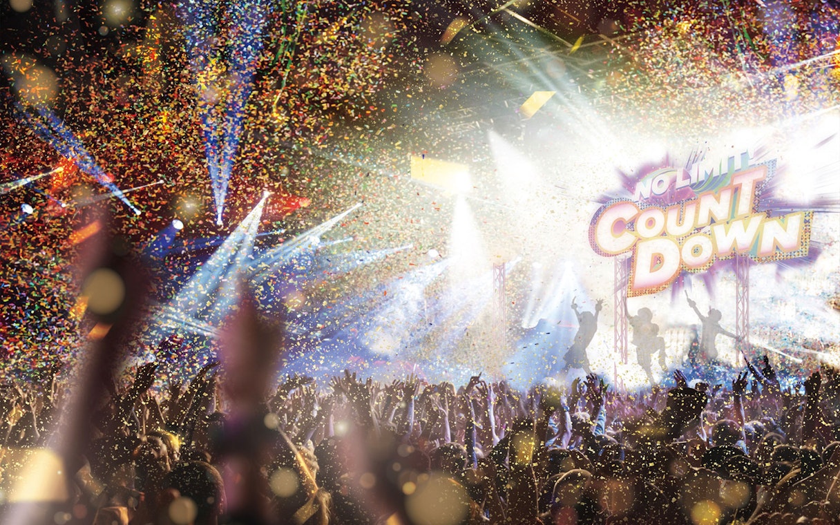 Crowd celebrating with confetti and lights at Universal Studios Japan NO LIMIT! Countdown 2025.