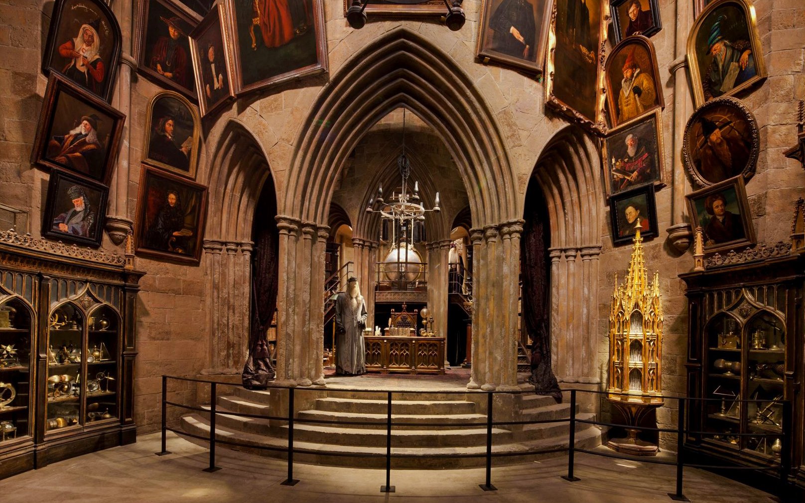 Dumbledore's office with portraits and artifacts at Warner Bros Studio, London.