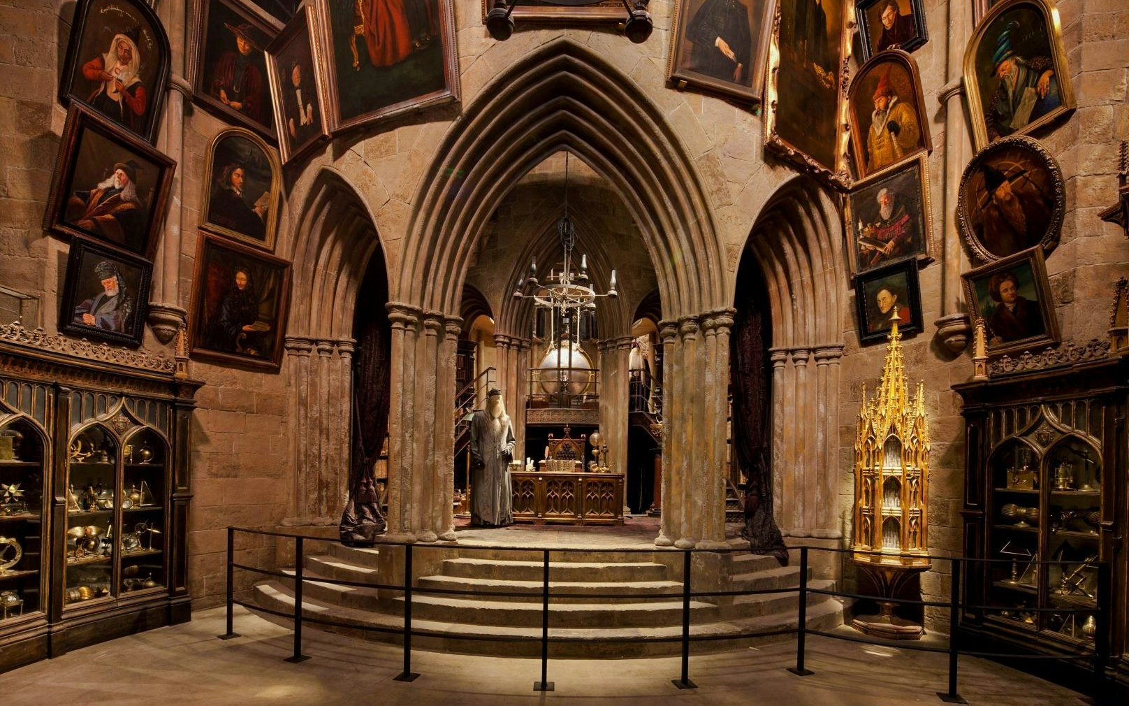 Dumbledore's office with portraits and artifacts at Warner Bros Studio, London.