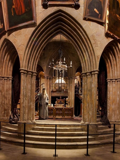 Dumbledore's office with portraits and artifacts at Warner Bros Studio, London.