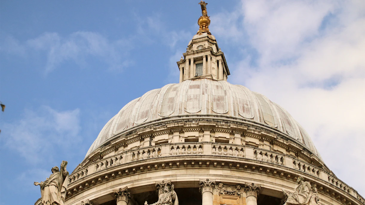 St Paul's Cathedral dome with statues, London.