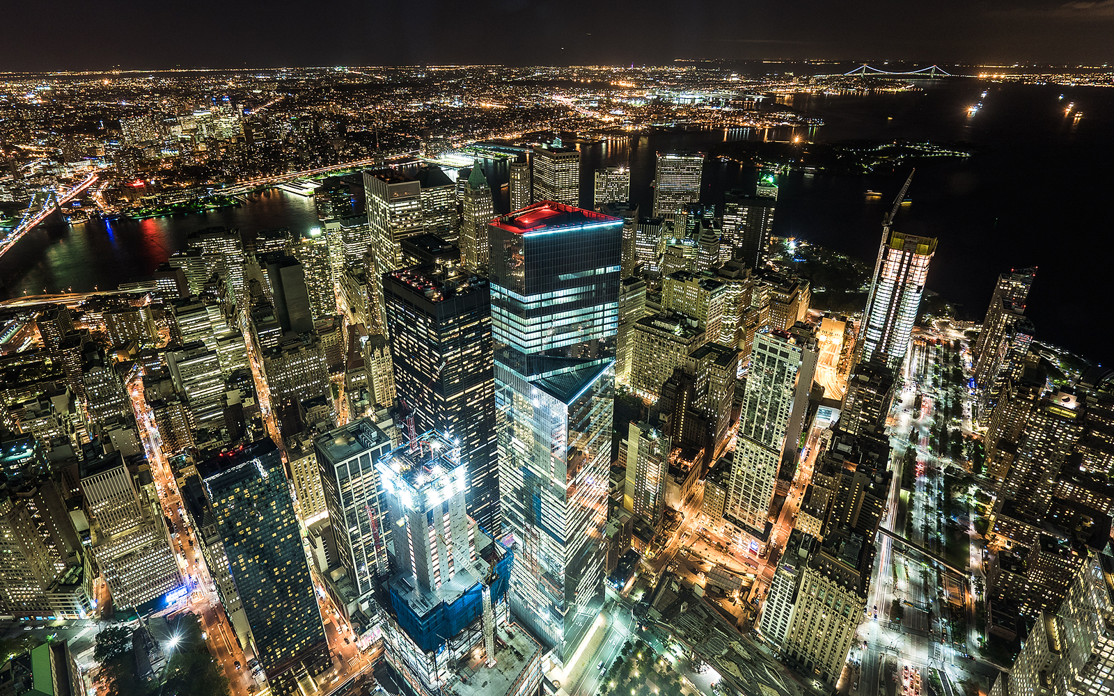 Aerial view of New York City skyline at night from One World Observatory.