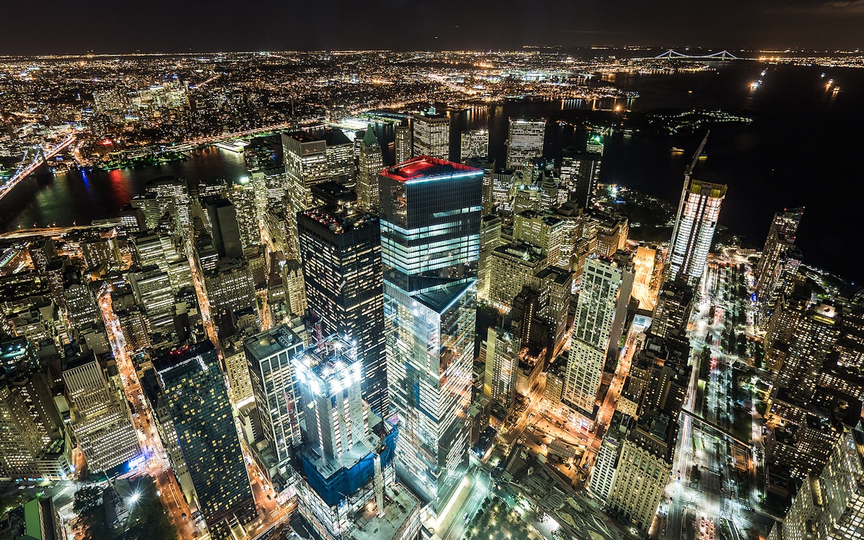 Aerial view of New York City skyline at night from One World Observatory.