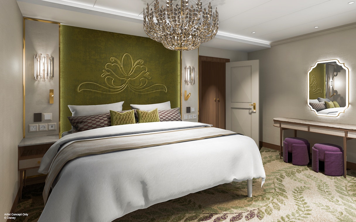 Concierge Suite bedroom with elegant decor, Disney Adventure Cruise.
